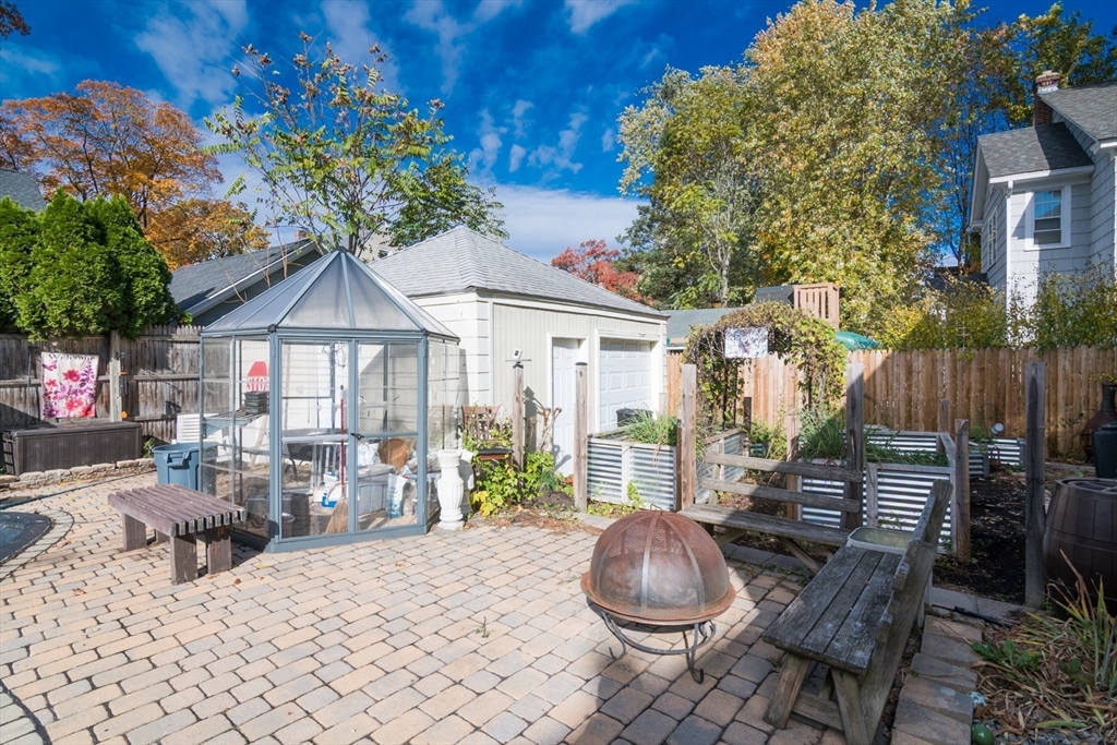 28 Rencelau Street Springfield, MA 01118 - Photo 33 of 34 a outdoor living space with furniture and a garden