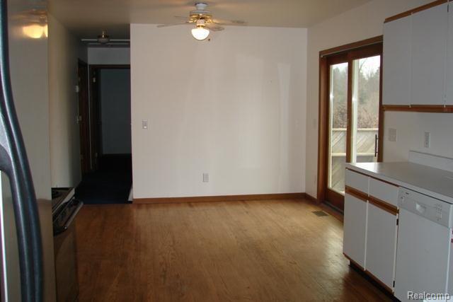 3564 Fish Lake Road Lapeer, MI 48446 - Photo 8 of 34 Woodflooring in kitchen.jpg