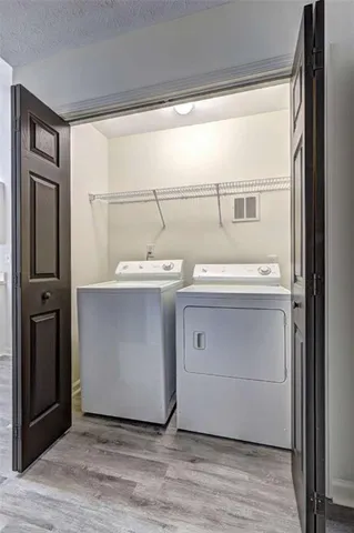 a utility room with a washer and dryer