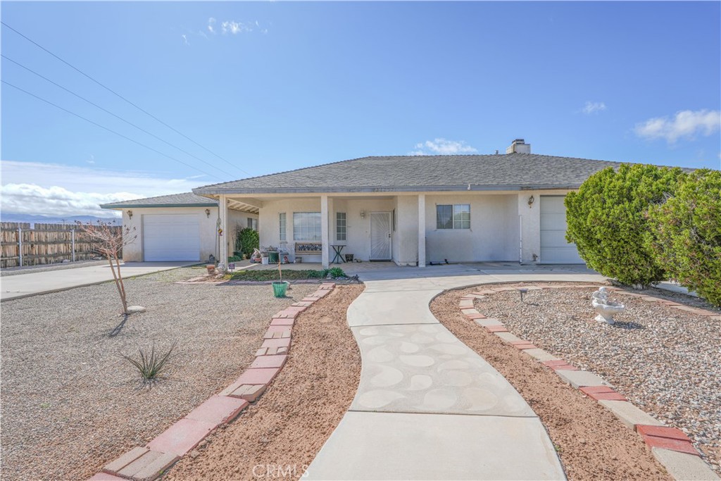 21257 Del Oro Road Apple Valley, CA 92308 - Photo 1 of 1 a view of a house with a backyard