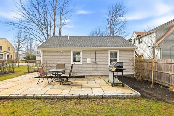 a kitchen with stainless steel appliances a stove microwave and sink