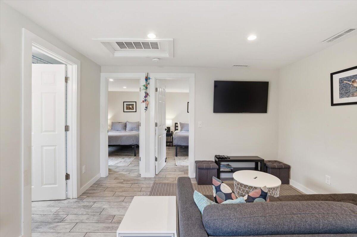 20 Nye Road, Unit 2026 Falmouth, MA 02540 - Photo 50 of 72 a living room with furniture and a flat screen tv