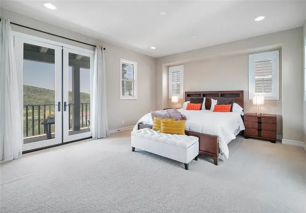 a bed room with furniture and a window