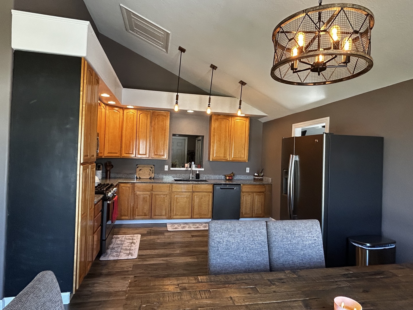 12795 Lawrence Road Sterling, IL 61081 - Photo 20 of 42 a kitchen with a refrigerator and a stove