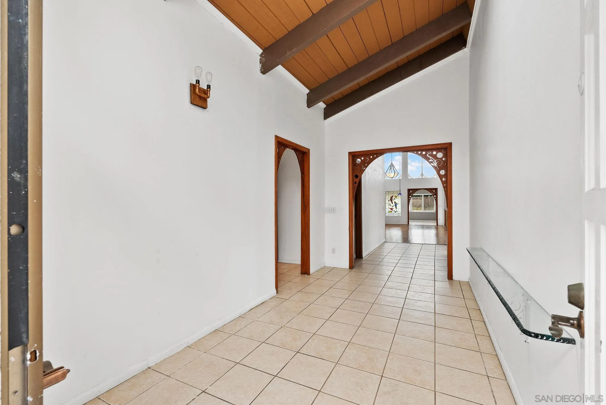 31162 Old River Road Bonsall, CA 92003 - Photo 11 of 44 a view of a hallway with wooden floor