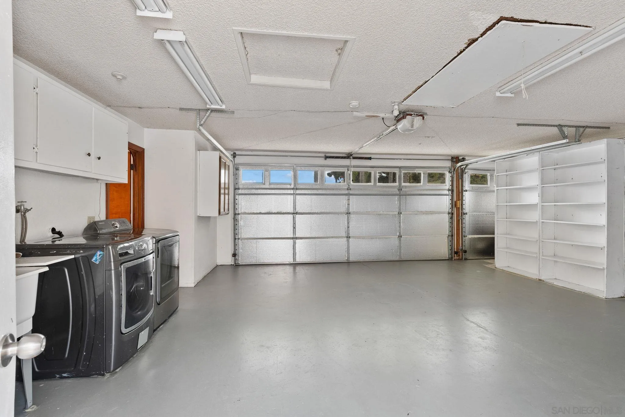 31162 Old River Road Bonsall, CA 92003 - Photo 14 of 44 a view of a garage room