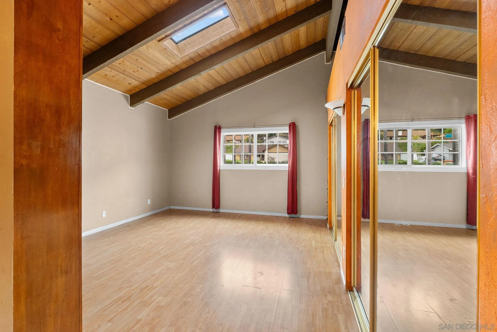 31162 Old River Road Bonsall, CA 92003 - Photo 20 of 44 a view of an empty room with a window