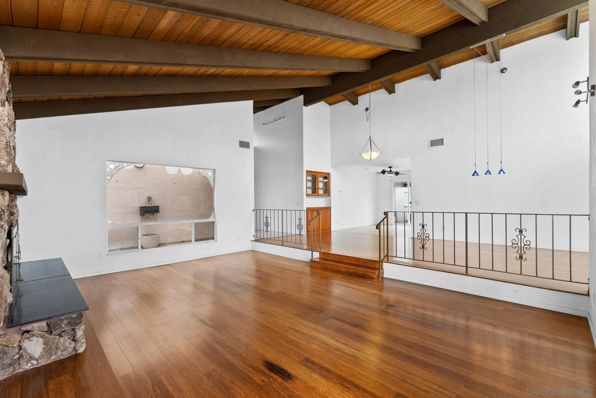 31162 Old River Road Bonsall, CA 92003 - Photo 29 of 44 a view of empty room with wooden floor
