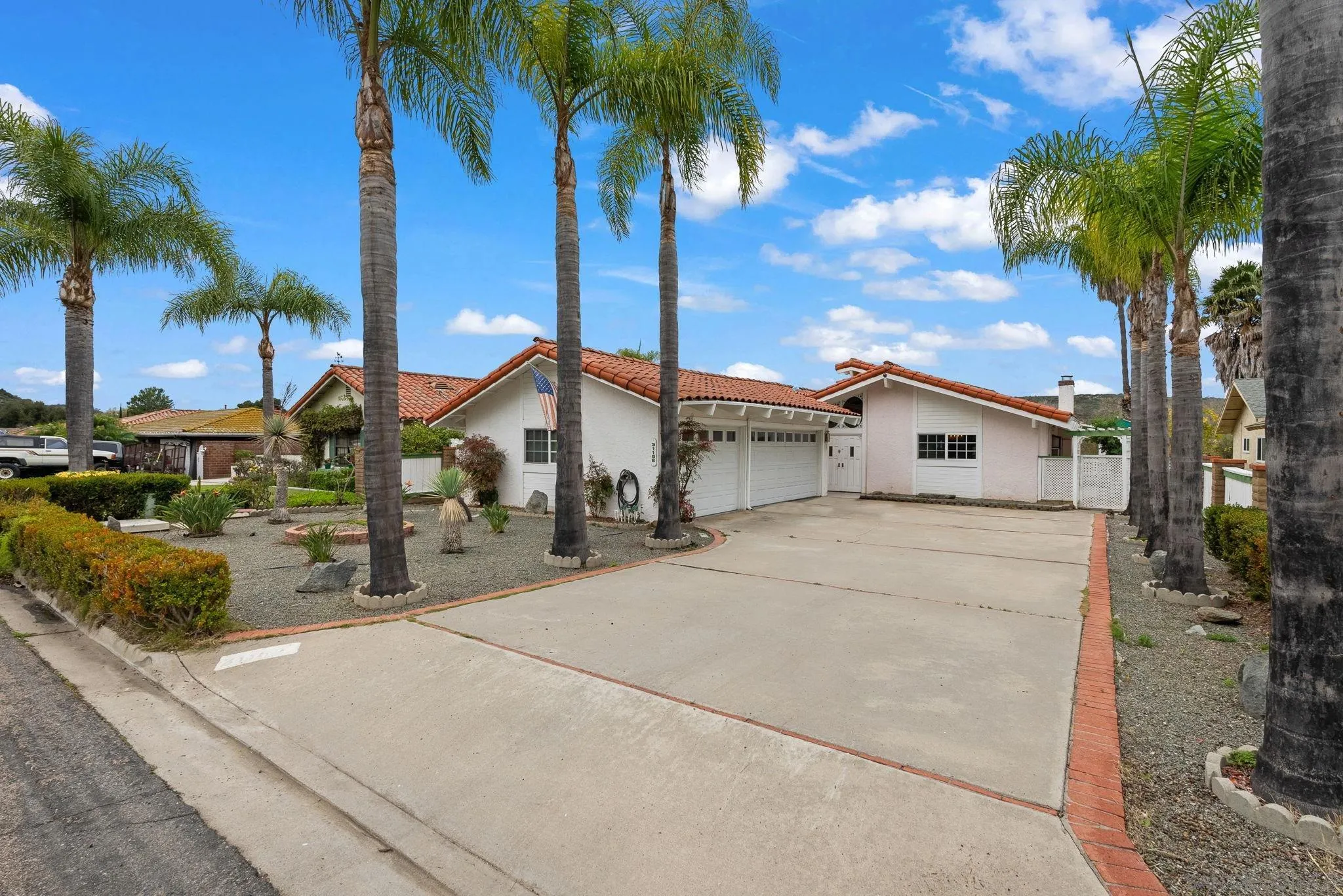 31162 Old River Road Bonsall, CA 92003 - Photo 8 of 44 a front view of a house with garden