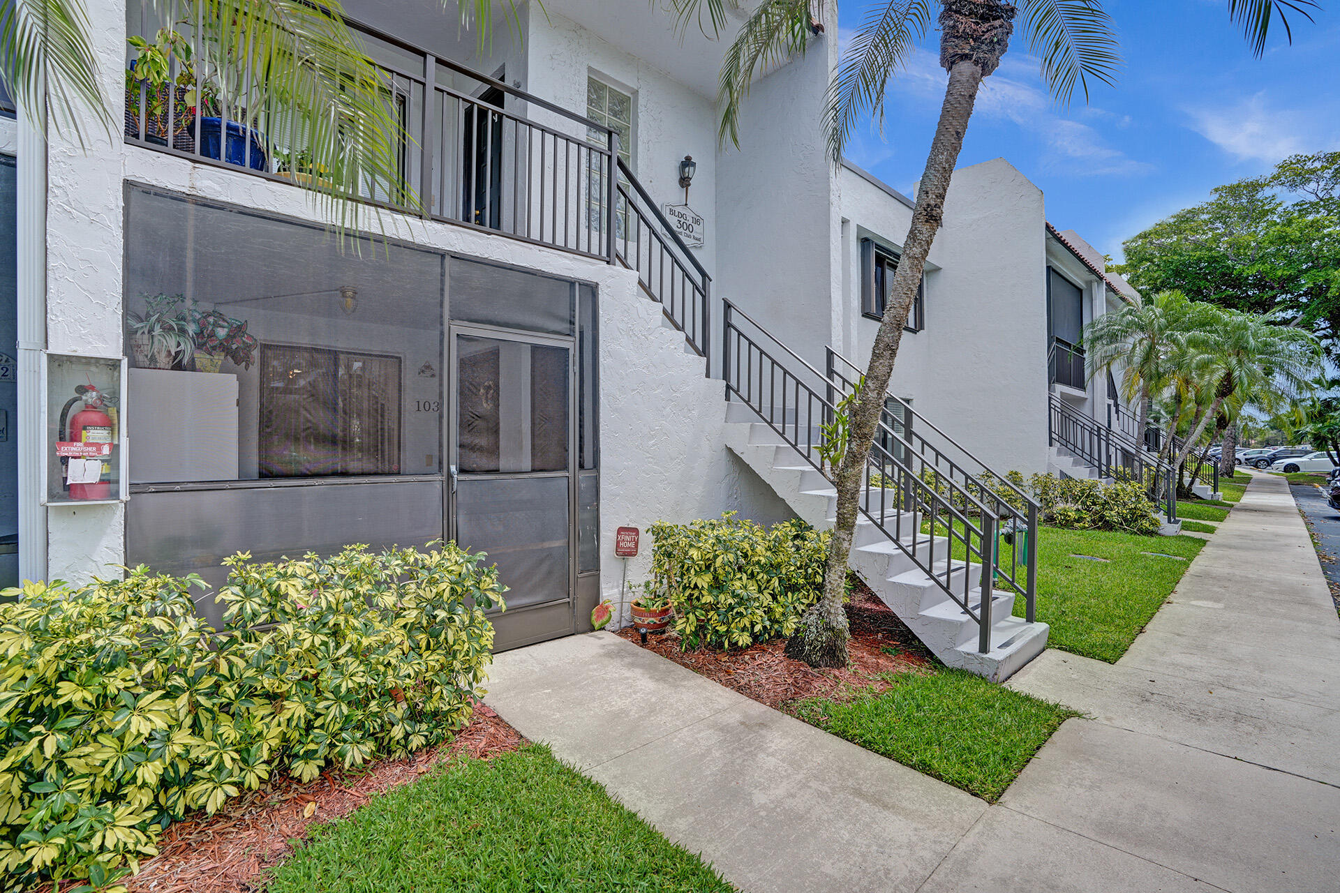300 Racquet Club Road, Unit 103 Weston, FL 33326 - Photo 2 of 31 front view of a house