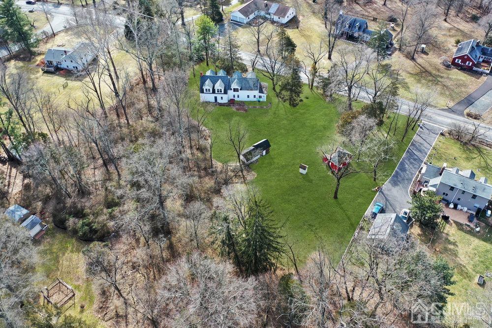 Half Foothill Road Bridgewater, NJ 08807 - Photo 16 of 35 a aerial view of a house with a yard basket ball court and outdoor seating