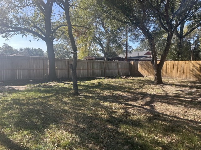 807 Erin Street El Campo, TX 77437 - Photo 3 of 13 a view of a backyard