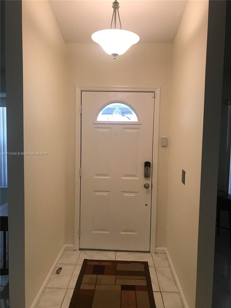 7379 Shell Ridge Terrace Lake Worth, FL 33467 - Photo 11 of 22 a bathroom with a shower