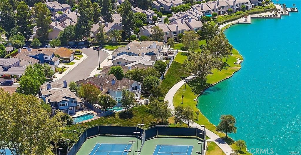 an aerial view of a house with a swimming pool