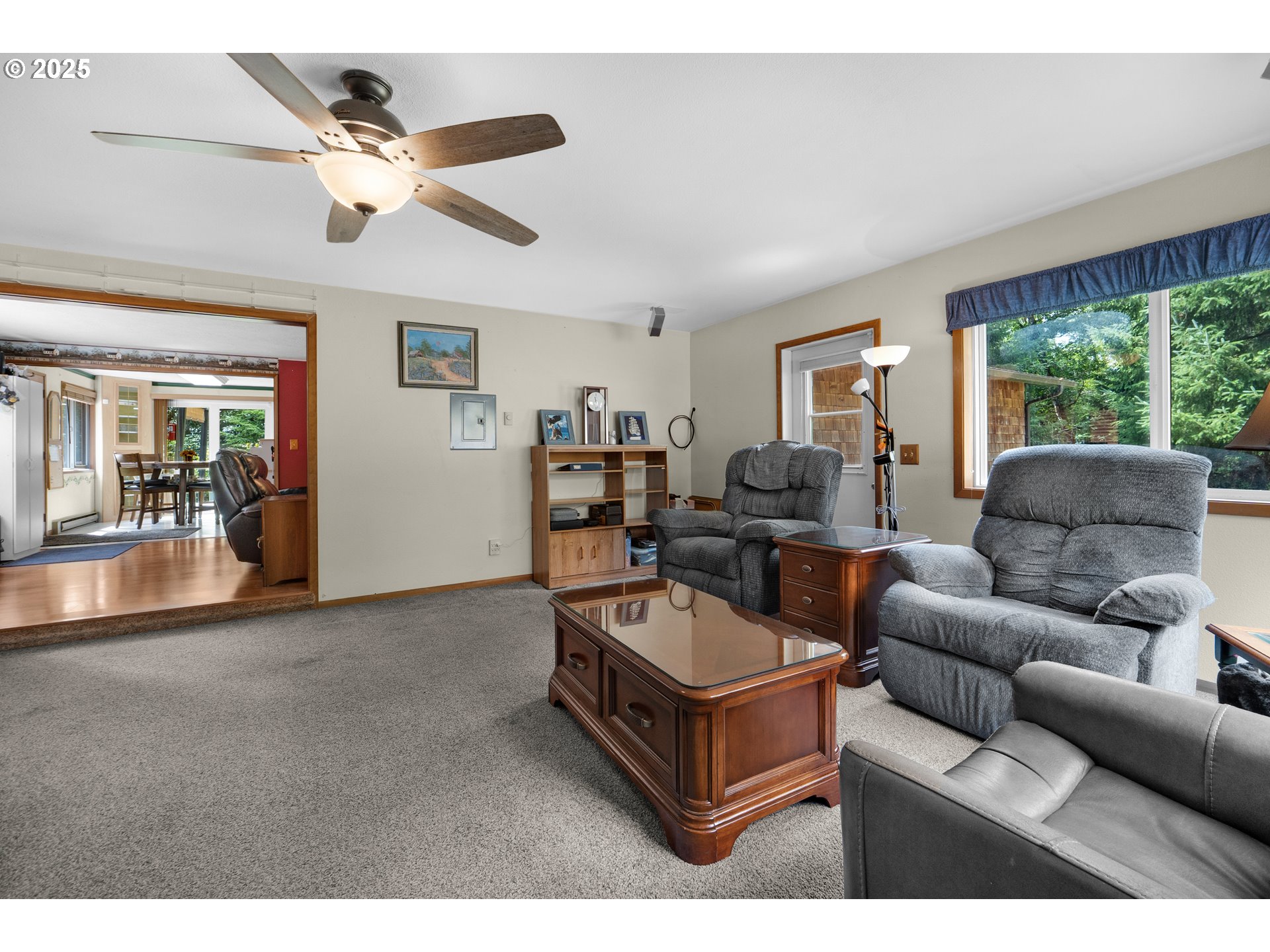 89869 Highway 202 Astoria, OR 97103 - Photo 19 of 30 a living room with furniture and a large window