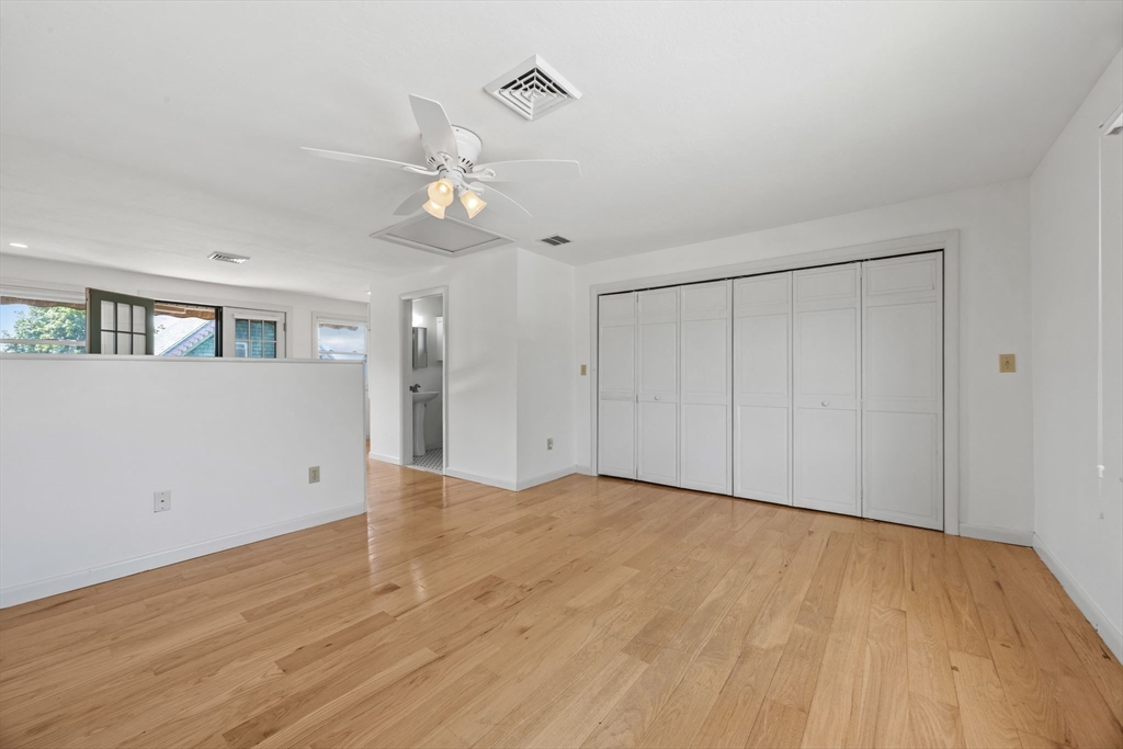 7 Grove Street Wareham, MA 02558 - Photo 25 of 41 a view of an empty room with wooden floor