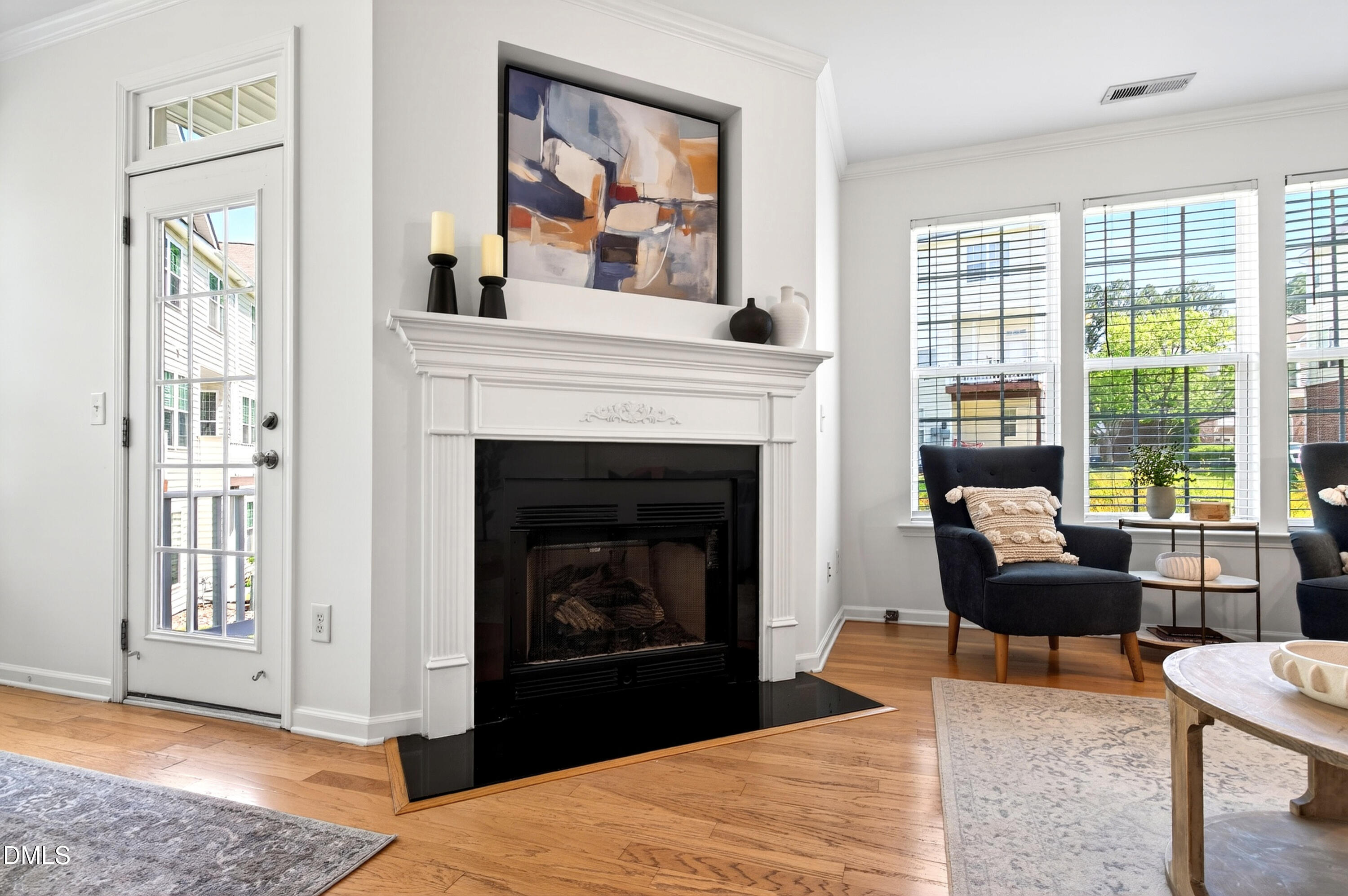 5415 Crescentview Parkway Raleigh, NC 27606 - Photo 34 of 64 a living room with furniture and a fireplace