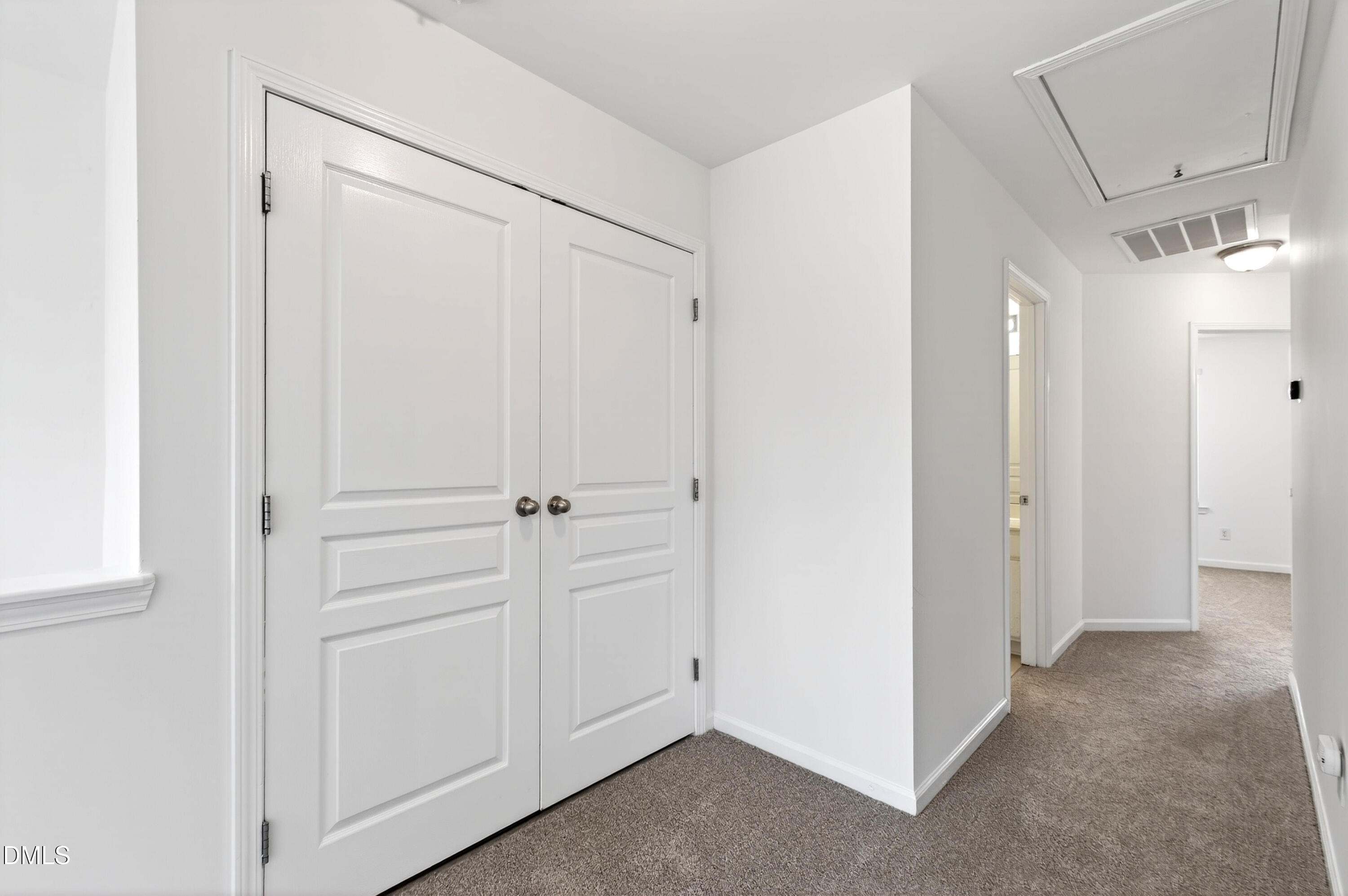 5415 Crescentview Parkway Raleigh, NC 27606 - Photo 39 of 64 a view of a closet area with ceiling fan