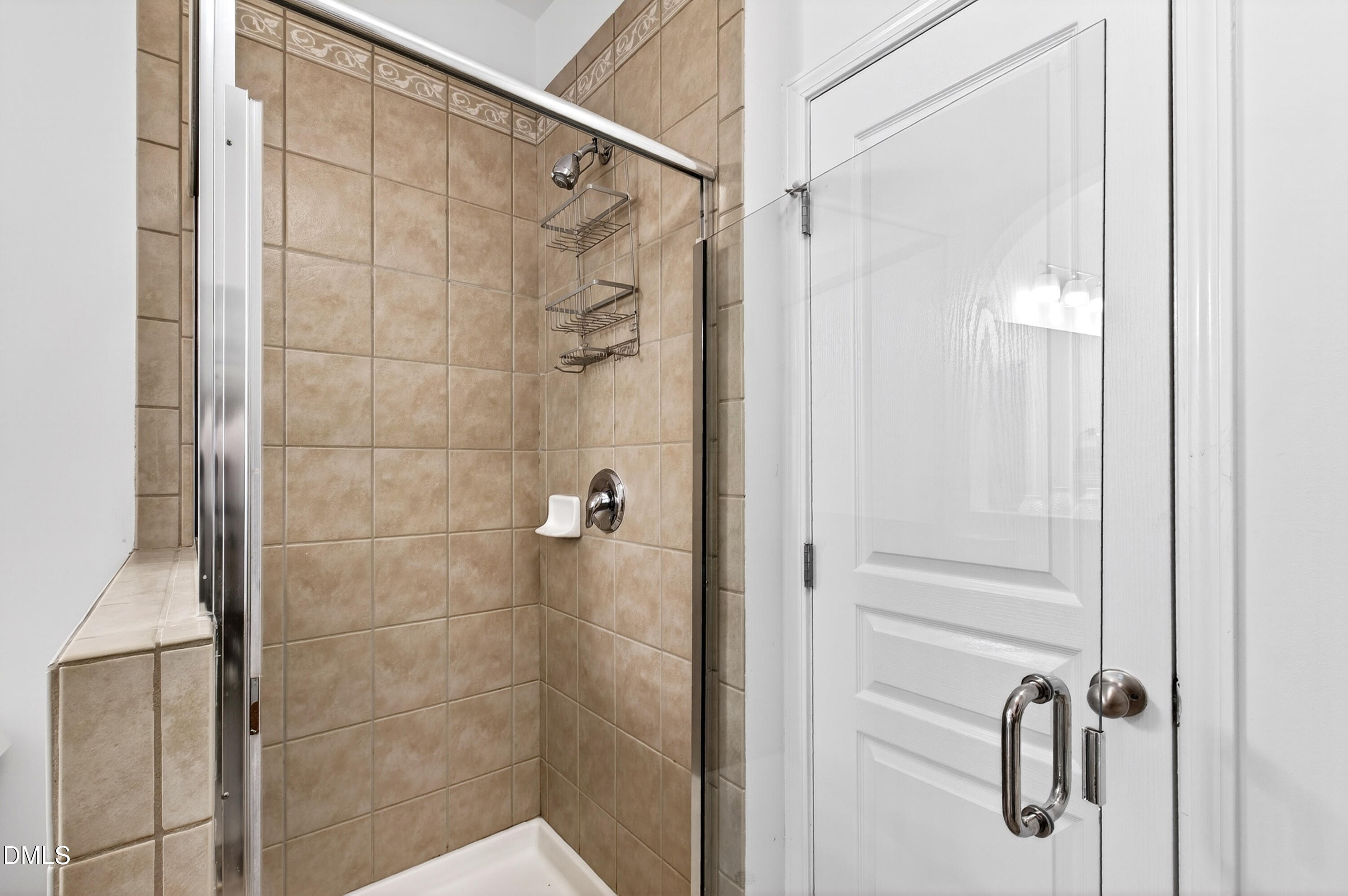 5415 Crescentview Parkway Raleigh, NC 27606 - Photo 43 of 64 a bathroom with a glass shower door
