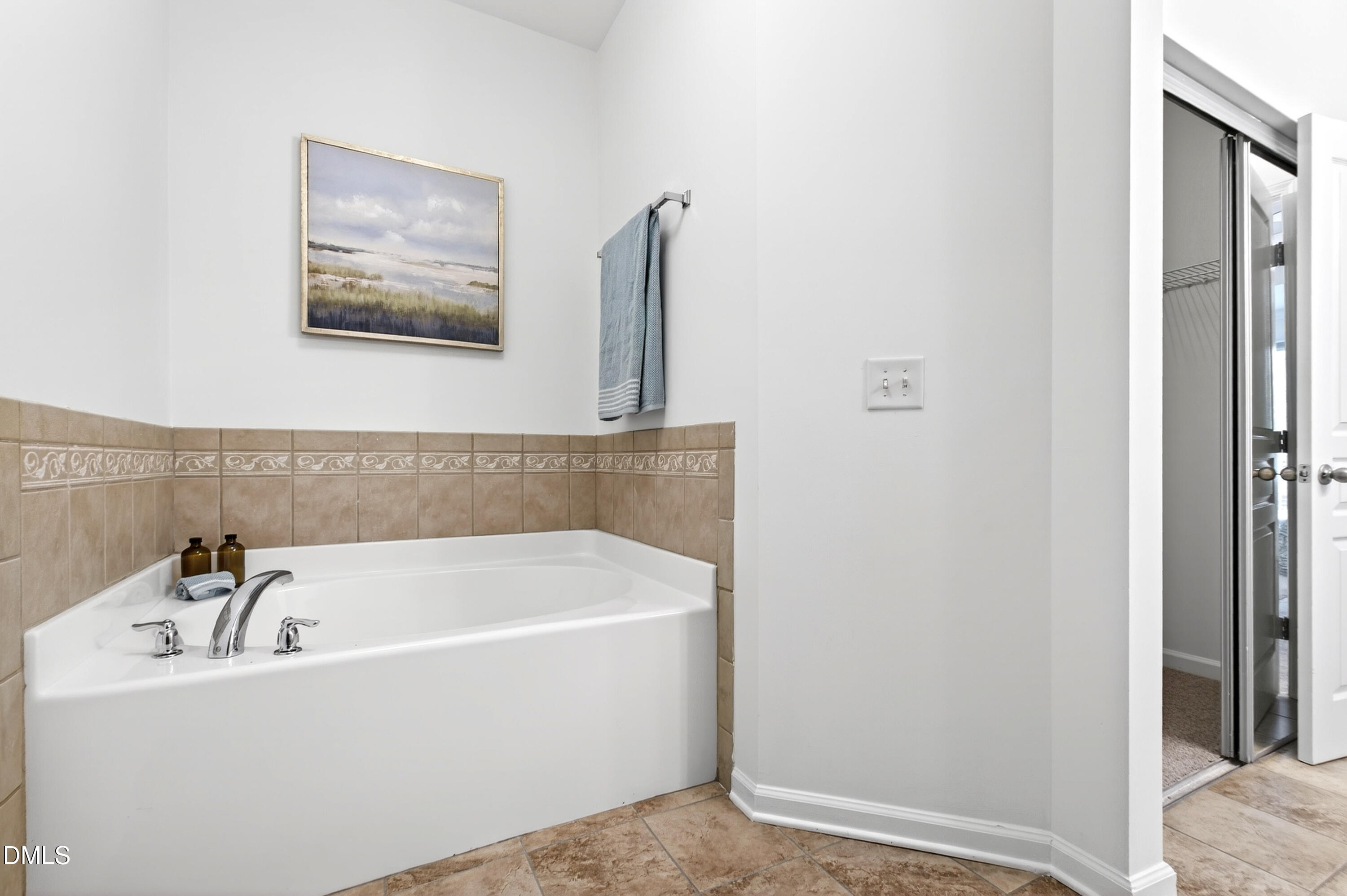 5415 Crescentview Parkway Raleigh, NC 27606 - Photo 44 of 64 a white bath tub sitting next to a white sink