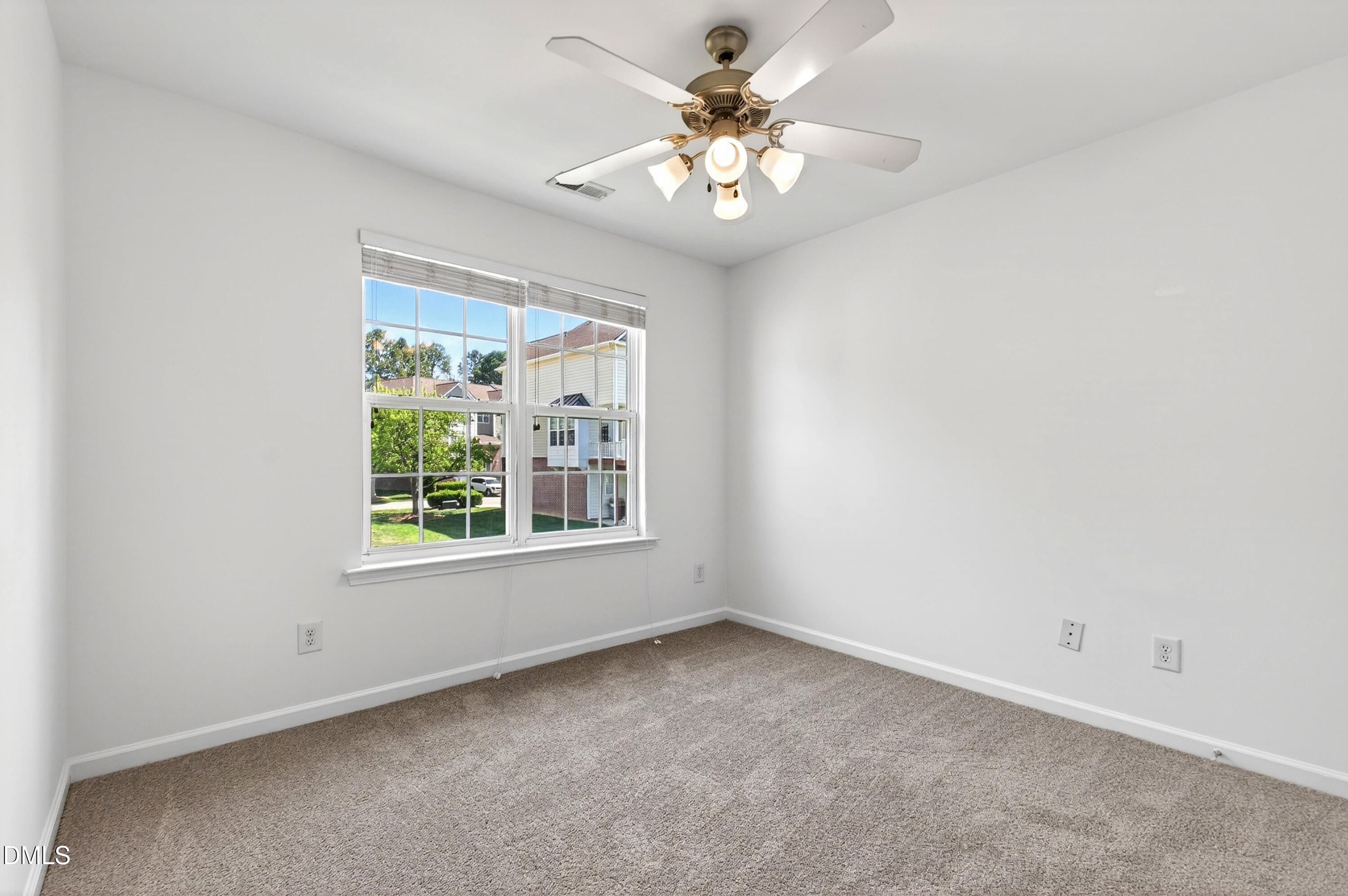 5415 Crescentview Parkway Raleigh, NC 27606 - Photo 50 of 64 an empty room with a window