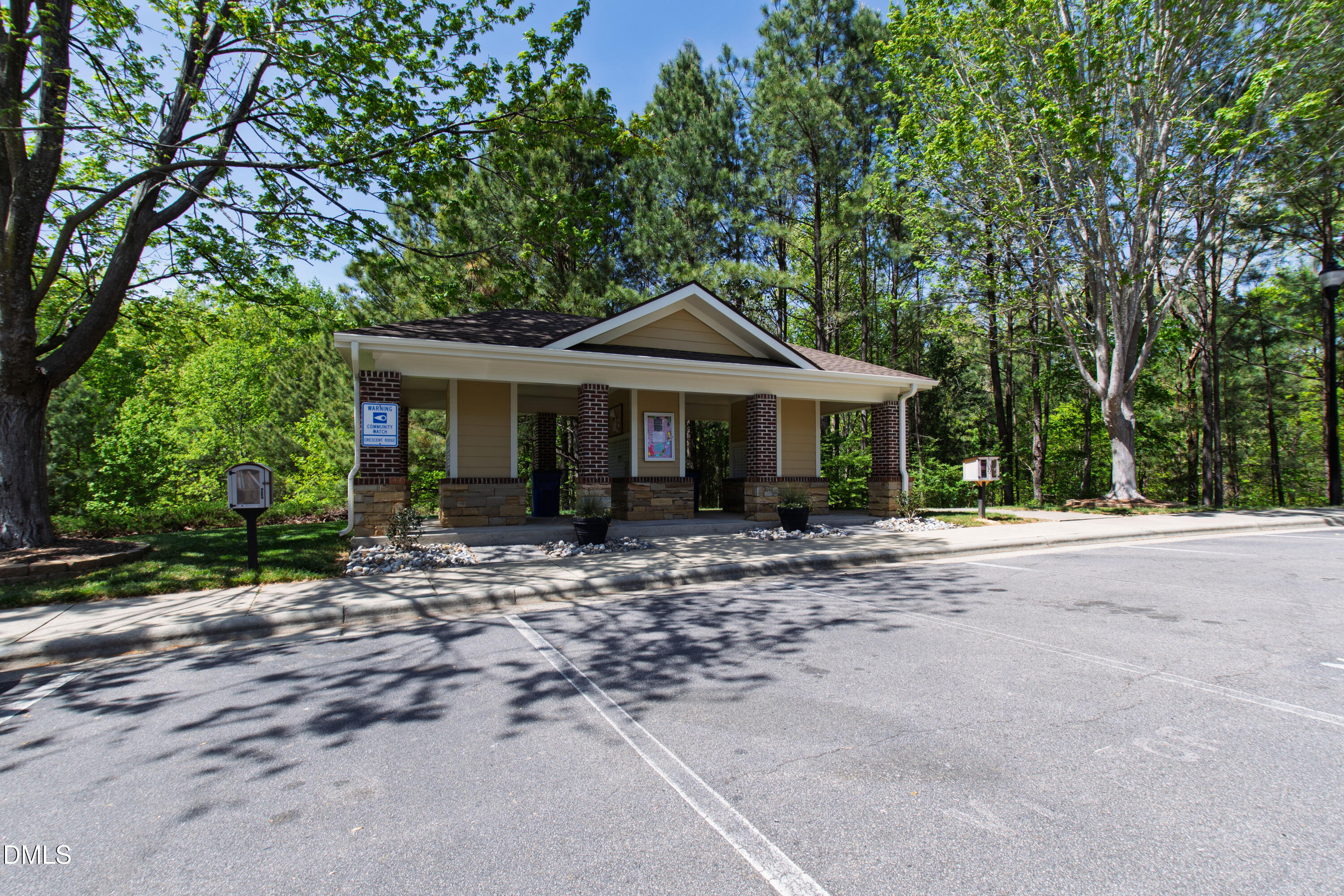 5415 Crescentview Parkway Raleigh, NC 27606 - Photo 52 of 64 a front view of a house with a garden