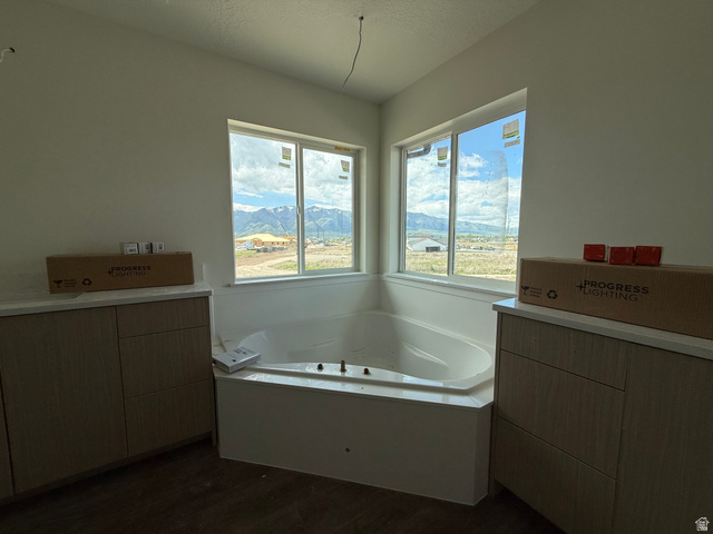 1008 West 3410 South Nibley, UT 84321 - Photo 14 of 26 Corner soaking tub with surrounding windows