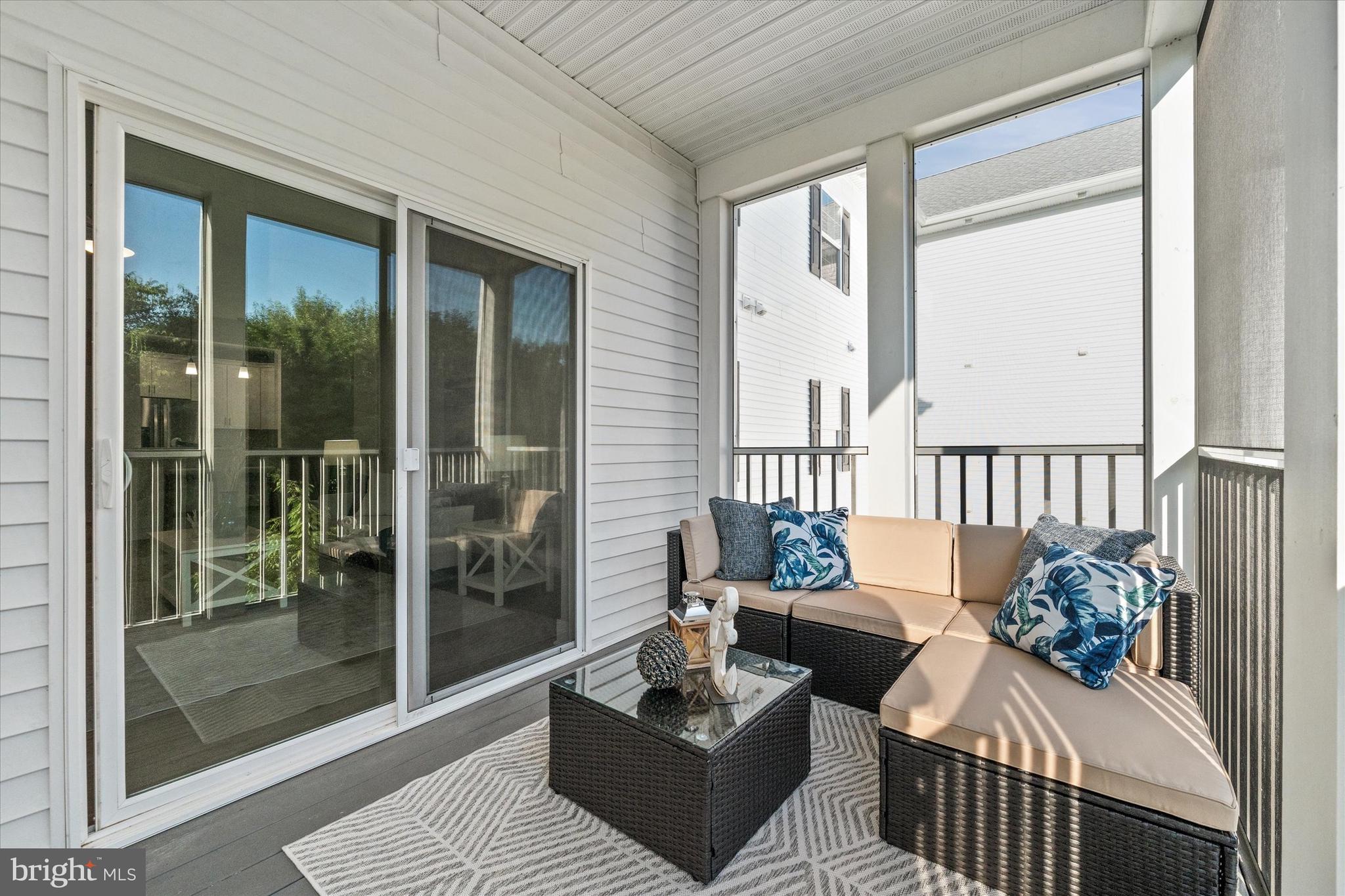 30609 Cedar Neck Road, Unit 3205 Ocean View, DE 19970 - Photo 6 of 28 a living room with furniture and a window