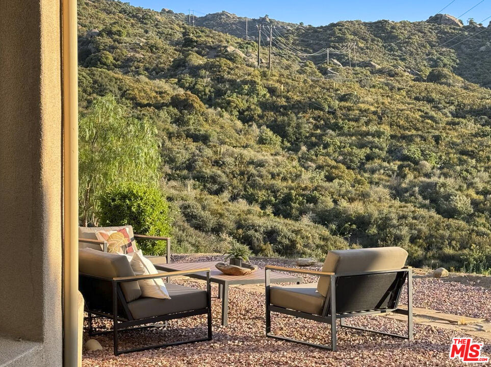 969 Crown Hill Drive Simi Valley, CA 93063 - Photo 44 of 62 a view of a chairs and table in the balcony