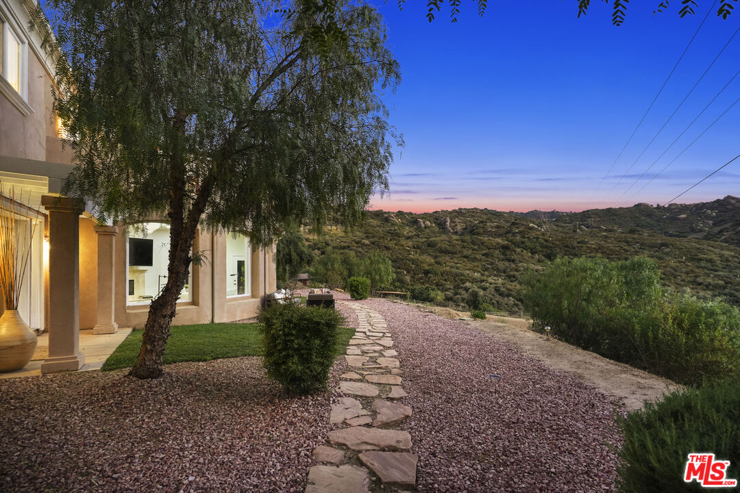 969 Crown Hill Drive Simi Valley, CA 93063 - Photo 54 of 62 a pathway of a house with a yard
