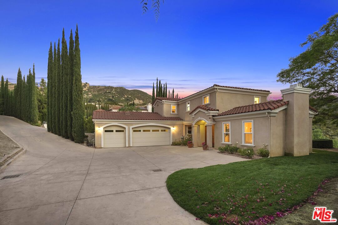 969 Crown Hill Drive Simi Valley, CA 93063 - Photo 59 of 62 a view of a house with a yard