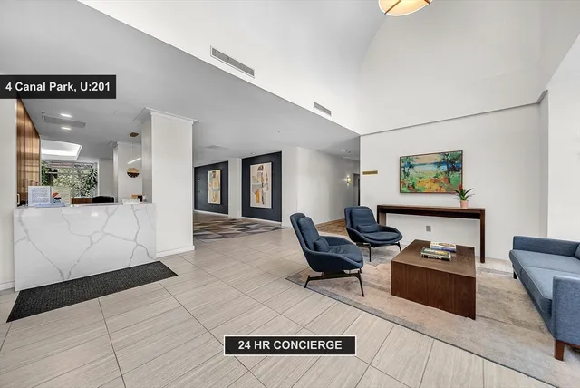 a large white building with glass door