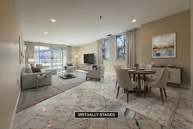 a view of livingroom with an empty space and window