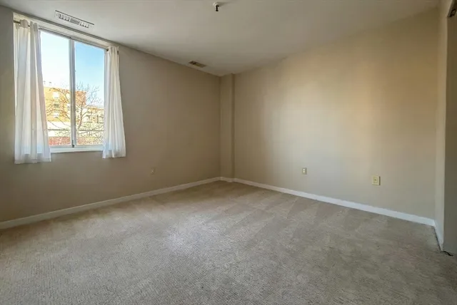 a view of a chairs and table in the balcony