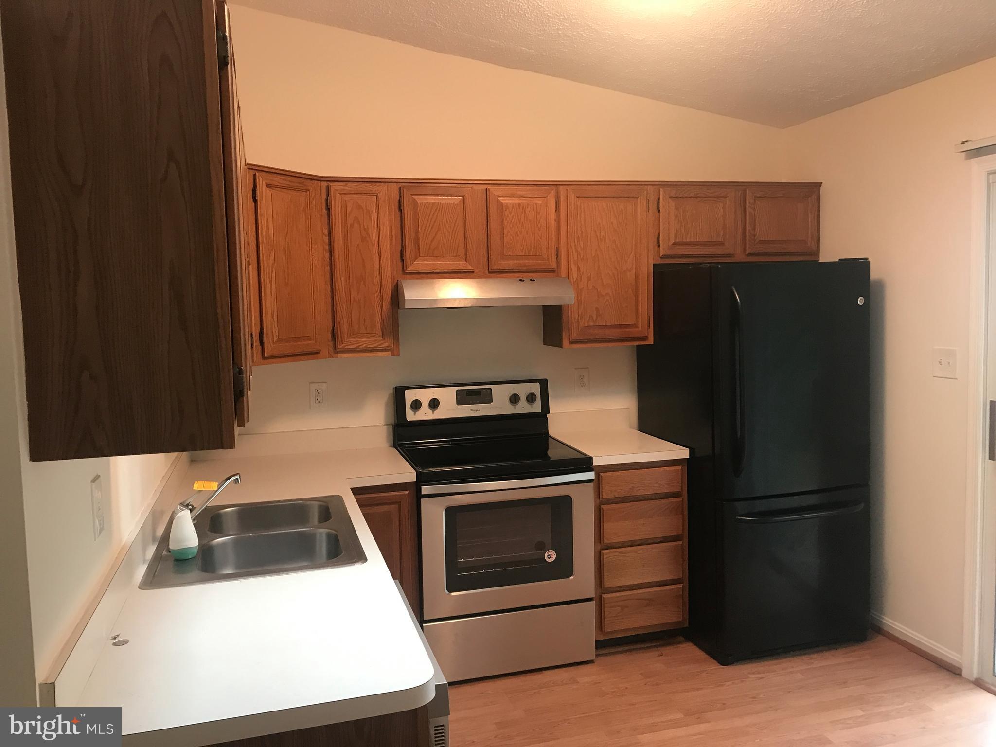 336 Rachaels Way Prince Frederick, MD 20678 - Photo 13 of 30 Kitchen has nice warm feel with skylight