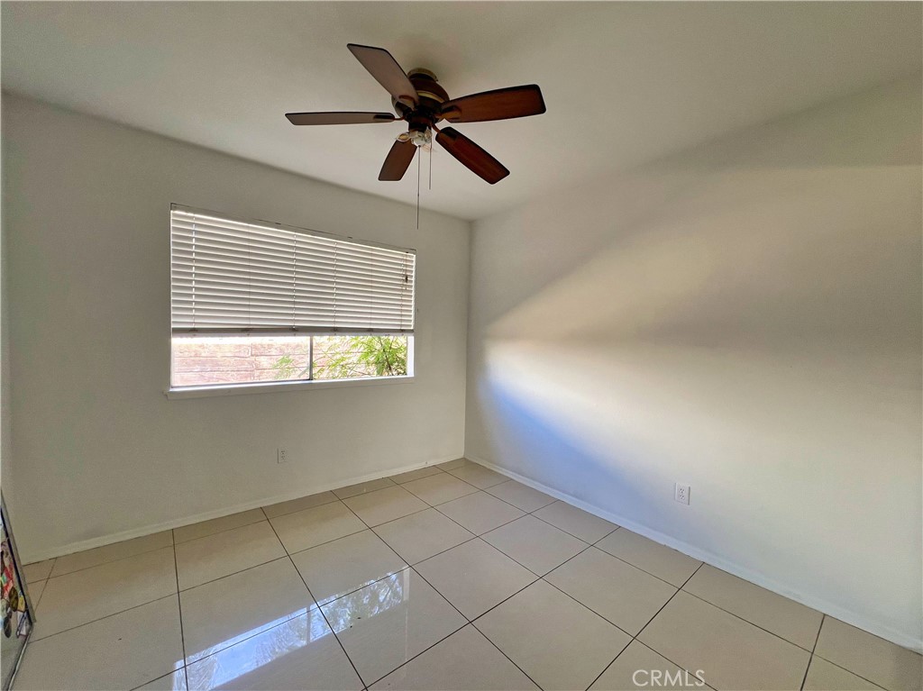 22574 Kentfield Street Grand Terrace, CA 92313 - Photo 12 of 22 a view of empty room with windows