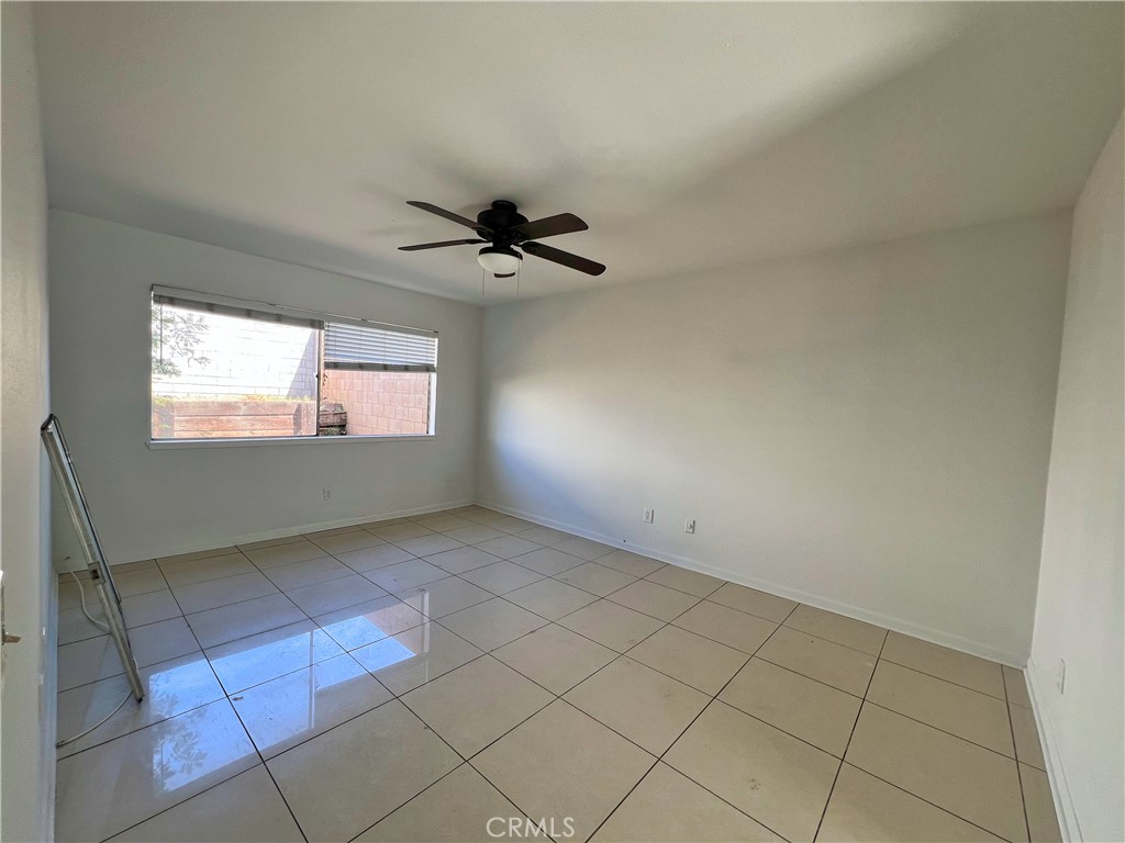 22574 Kentfield Street Grand Terrace, CA 92313 - Photo 15 of 22 a view of an empty room with a window