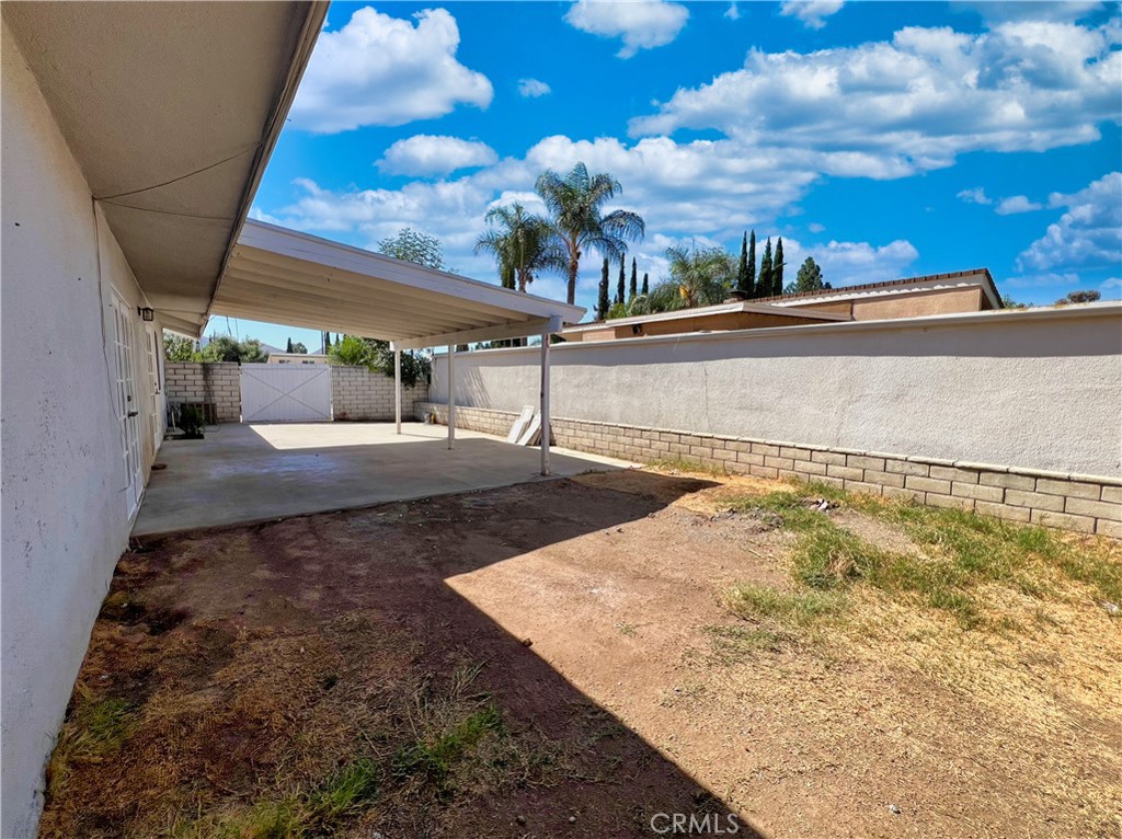 22574 Kentfield Street Grand Terrace, CA 92313 - Photo 20 of 22 a view of a swimming pool with an outdoor space