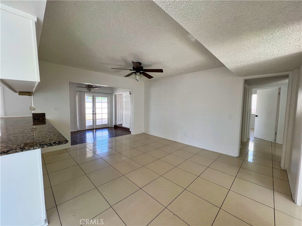 22574 Kentfield Street Grand Terrace, CA 92313 - Photo 10 of 22 a view of a livingroom and a bathroom