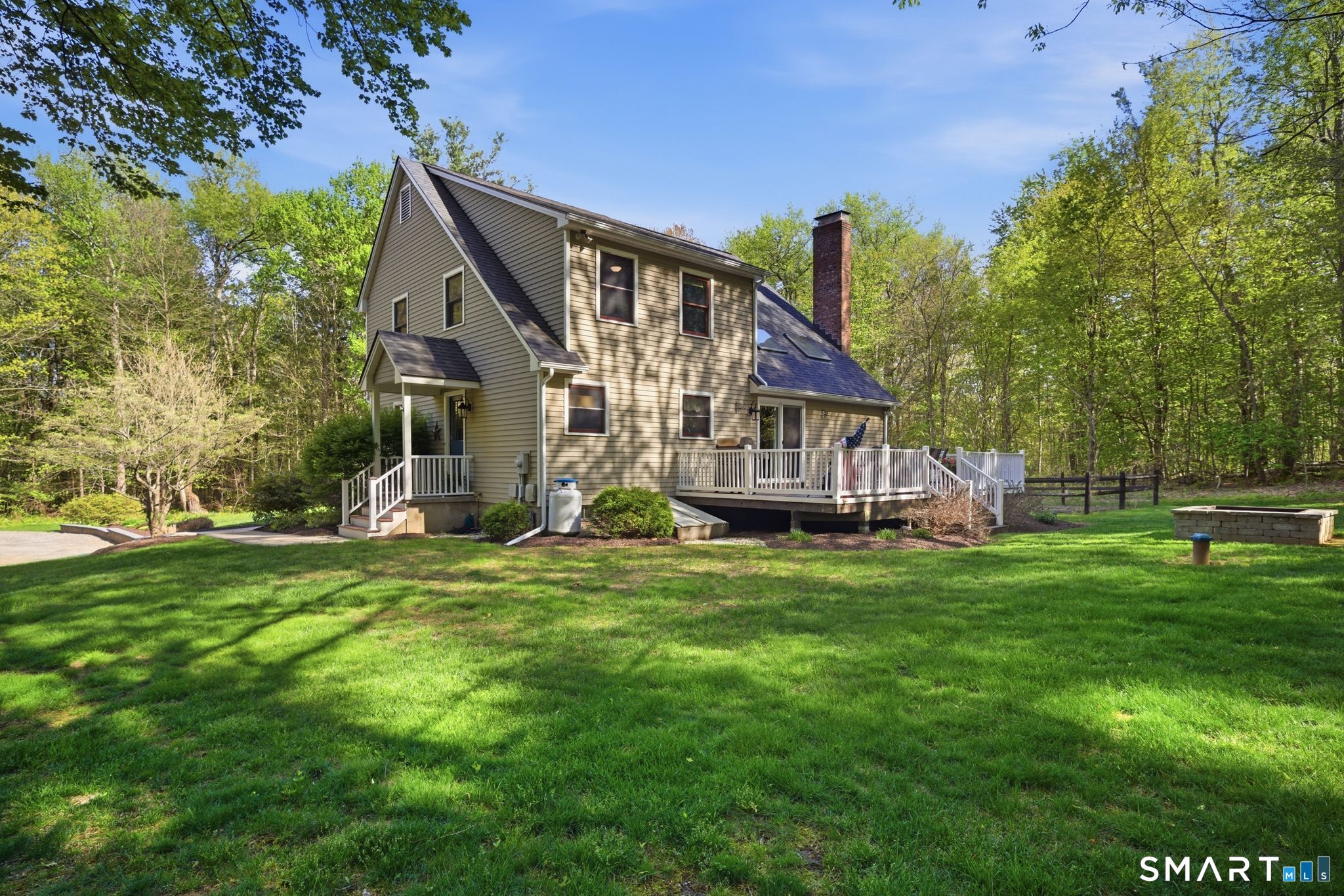 174 Walnut Hill Road Hartland, CT 06027 - Photo 33 of 36 a view of a house with a big yard