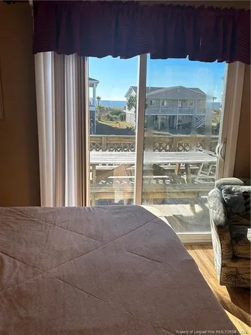 a view of a living room and window