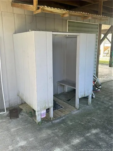 a view of a room with wooden walls
