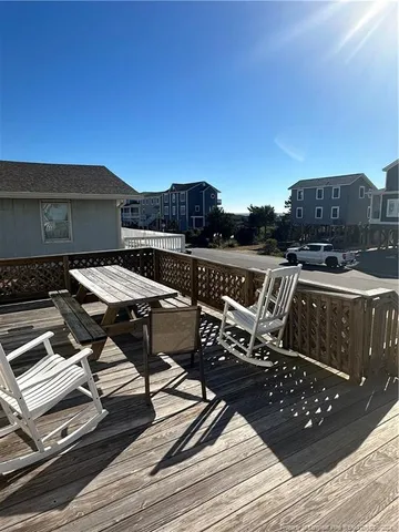 a view of a terrace with chairs