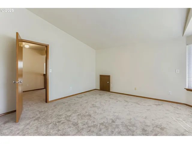 a bathroom with a double vanity sink and mirror