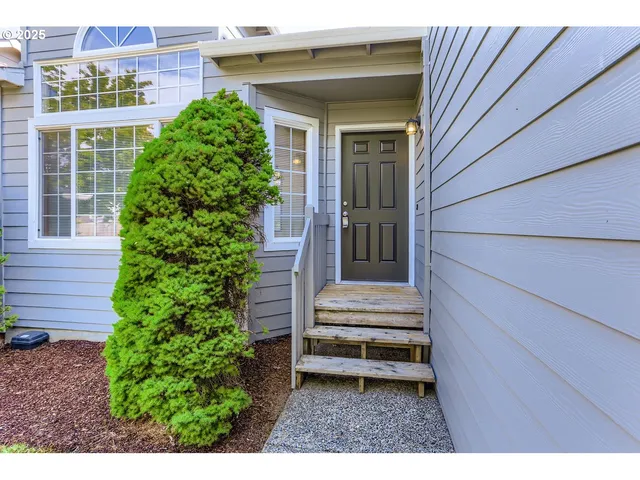 a view of outdoor space and front view of a house
