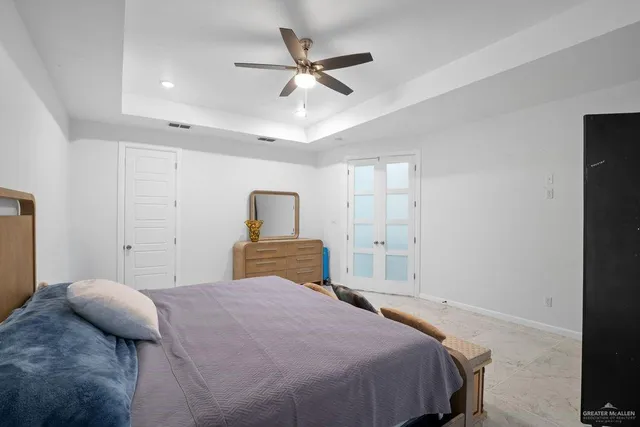 a bathroom with a sink double vanity and a shower