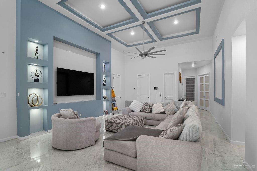 202 North 32nd Street Hidalgo, TX 78557 - Photo 8 of 21 a living room with furniture and a flat screen tv