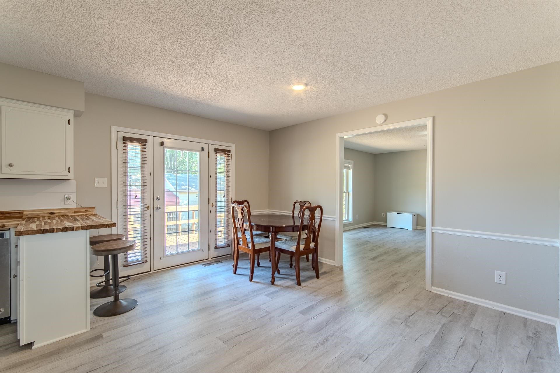 606 Duren Drive Adamsville, TN 38310 - Photo 16 of 40 a dining room with furniture and wooden floor