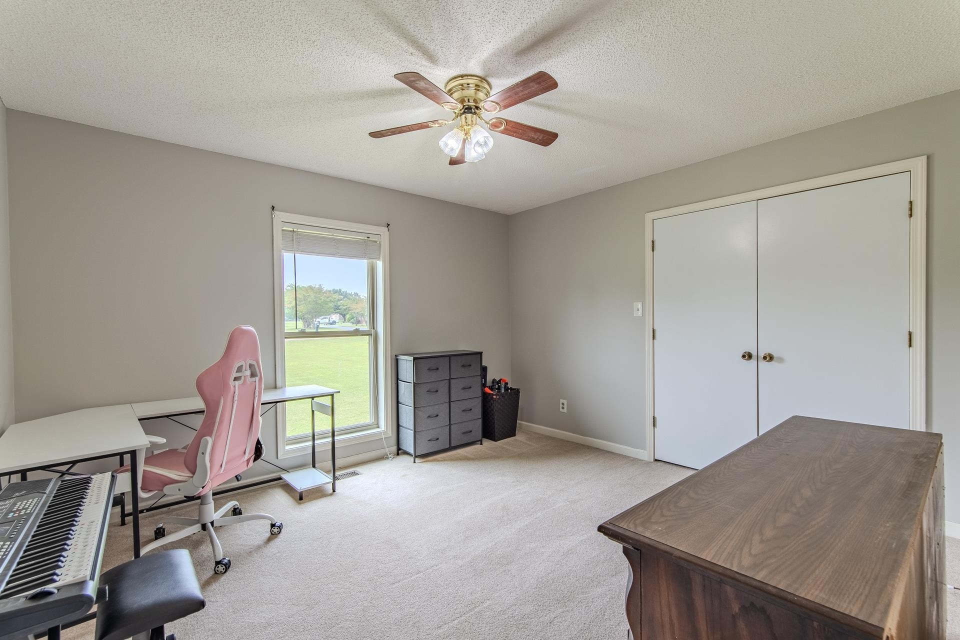 606 Duren Drive Adamsville, TN 38310 - Photo 19 of 40 a workspace with furniture and window