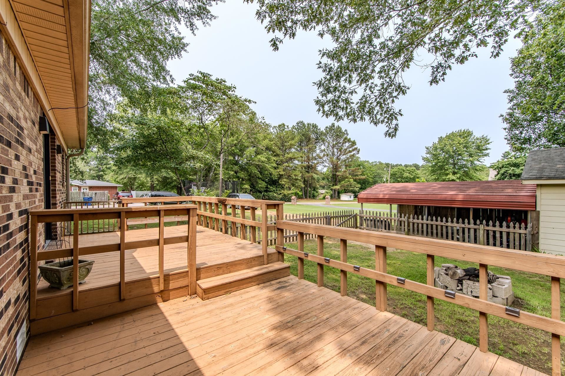 606 Duren Drive Adamsville, TN 38310 - Photo 34 of 40 a view of balcony with deck and wooden floor